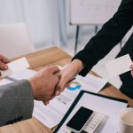 cropped-view-of-business-partners-shaking-hands-an-SUBGQMC-p725ji5c1nenku0x06yu5kd5fhv0q36f26mxkiv3vg